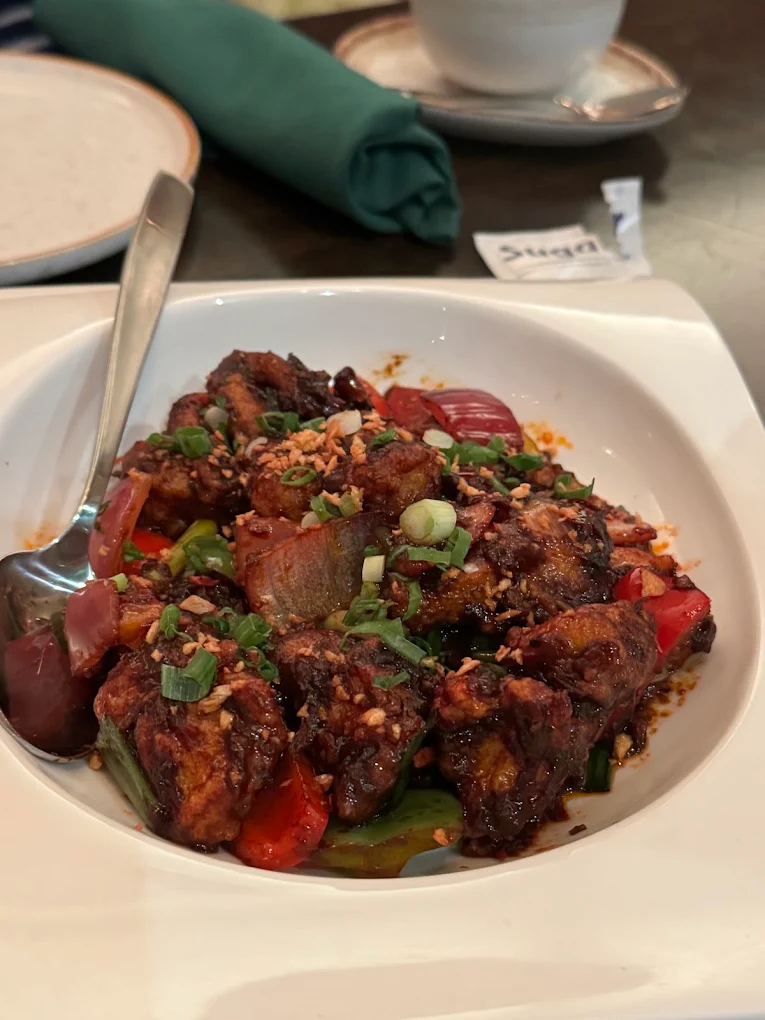Chilli pork with peppers, onions, and scallions