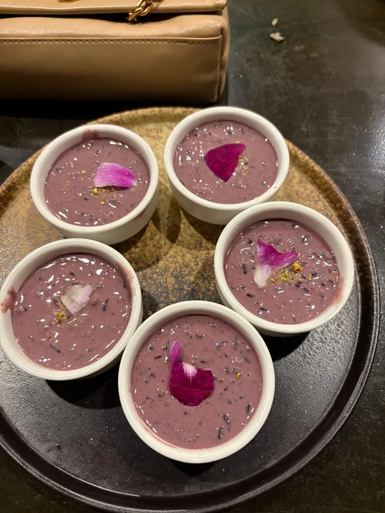 Black Rice Pudding — five cups of creamy black rice pudding with rose petals